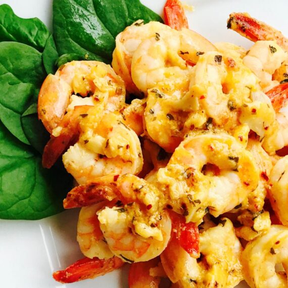 Passion Fruit Shrimp Teaser on a plate with fresh basil