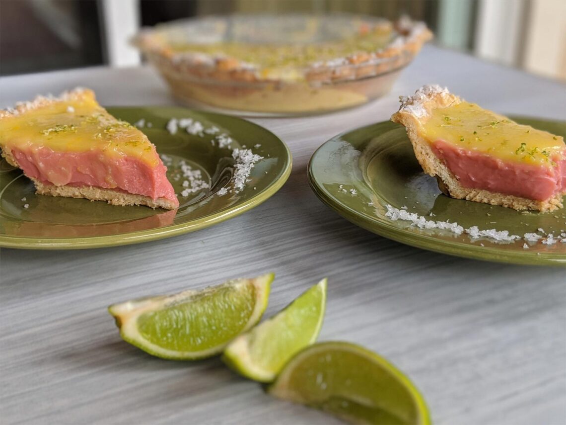 Strawberry Margarita Pie Slices with lime wedges on the table