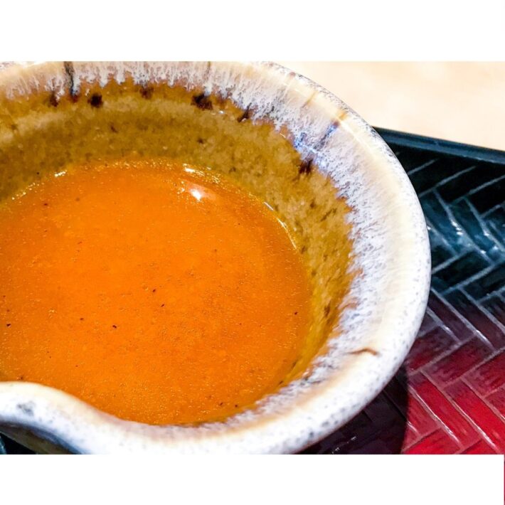 Amazing Passion Fruit Sauce Recipe in a white ceramic bowl